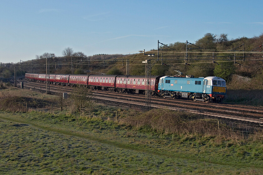 86259, outward leg of The London to Settle & Carlisle Railway, 07.08 London Euston-Carlisle (1Z86, 9E), Old Linslade 
 Making a glorious sight in the chilly early morning light 86259 'Peter Pan (on this side)/Les Ross' leads the outward leg of The London to Settle & Carlisle Railway charter passing Old Linslade. Running on its usual reporting number of 1Z86 the train left Euston at 07.08 with the AC electric leading all the way to Carlisle where steam took the train south courtesy of 35018 'British India Line'. 
 Keywords: 86259 The London to Settle & Carlisle Railway 07.08 London Euston-Carlisle 1Z86 Old Linslade Les Ross Peter Pan AL3