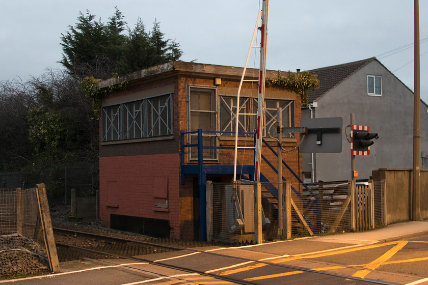 Dodworth signal box (BR, C.1959) 
 Dodworth signal box is not an attractive structure by anybody's standards! Built in or around 1959 the BR standard box served the junction with the Dodworth colliery as well as controlling the level crossing. After being renamed Redbrook Colliery it was closed in 1987, however, the box lingered on for a number of years finally closing in 2007 when the town was by-passed and traffic on the road in the foreground was reduced to a trickle. Allegedly, the signalling frame is still inside the box. 
 Keywords: Dodworth signal box