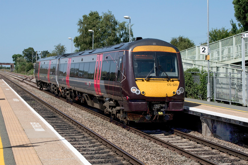 170520, XC 13.07 Nottingham-Cardiff Central (1V10, 6L), Ashchurch for Tewkesbury station 
 Ashchurch for Tewkesbury station, to give its full and proper name, is a soulless place on the Midland route northwards between Cheltenham and Worcester. It is on the site of the old station, simply called Ashchurch, that closed in November 1971. The new station opened some twenty-six years later in 1997 and has seen a dramatic rise in patronage leading to calls for an hourly service. Unusually, it has a free carpark that, not unexpectedly, meant that there were no spaces when Mike and I turned up for our visit. 170520 passes through the station at speed with the 13.07 Nottingham to Cardiff Central 1V10 Crosscountry service. 
 Keywords: 170520 13.07 Nottingham-Cardiff Central 1V10 Ashchurch for Tewkesbury station