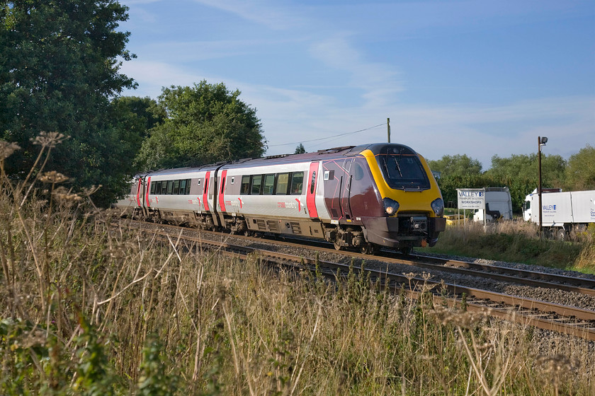 221134, XC 06.37 Bournemouth-ManchesterPiccadilly (1M26), King`s Sutton SP486377 
 221134 heads north towards its next stop at Banbury forming the 06.37 Bournemouth to Manchester Piccadilly. Spring and summer growth at this spot a short distance north of King's Sutton made photography at this spot a little tricky so it was a good job that I took my ladder and secateurs. 
 Keywords: 221134 06.37 Bournemouth-ManchesterPiccadilly 1M26 KIng`s Sutton SP486377 Cross Country Voyager