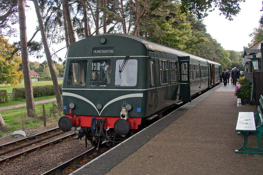 E51228 & E56062, 15.05 Holt-Sheringham ECS, Weybourne 
 The 15.05 Holt to Sheringham DMU service waits at Holt station some ten minutes prior to departure on 19th October 2022. It is being worked by a Class 101 DMU composed of E51228 and E56062. First-generation units such are these are fond widely throughout the many heritage lines as they are cheap to operate whilst still giving paying customers a flavour of railways past despite not being the more favoured steam trains! 
 Keywords: E51228 E56062 15.05 Holt-Sheringham ECS Weybourne Class 101 DMU