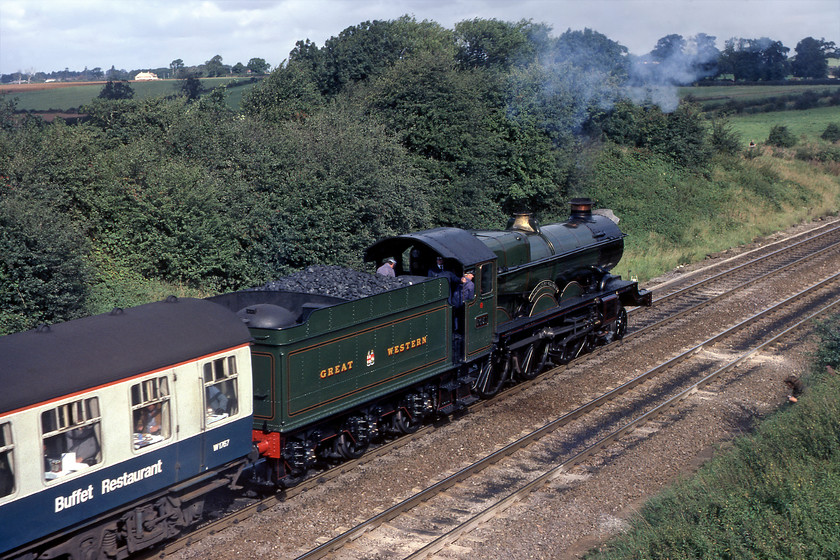 5051, outward leg of The John Mynors Memorial, London Paddington-Bridgnorth (SVR), Aynho Junction 
 Having been brought to a halt just south of Aynho Junction behind where I am standing, former GWR 4-6-0 5051 Drysllwyn Castle gets away with the outward leg of The John Mynors Memorial charter from Paddington to the Severn Valley Railway. 5051 came off the train at Dorridge with 25303 and 25258 taking the train onwards to Kidderminster. From there it was hauled to Bridgnorth and back by Churchward 2-8-0 freight loco. 2857 just prior to it being taken out of service for a much needed full overhaul. I hope that those sitting in the buffet restaurant car appreciated their positioning right behind the fine copper-topped locomotive taking in the full majesty of its exhaust whilst taking their breakfast!

There is an audio recording of this event on my Youtube channel see....https://youtu.be/c1ZaSjuyMyw 
 Keywords: 5051 The John Mynors Memorial, London Paddington-Bridgnorth SVR Aynho Junction Drysllwyn Castle