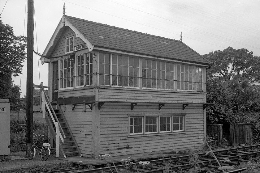 Goxhill signal box (GC, 1910) 
 A railway modeller's delight! The superb and unmolested Great Central Signal box at Goxhill is seen. It was opened in 1910 and was a Type 4 design with a thirty-six lever frame that has now become a fringe box following the resignalling of the 'mainline'. At the time of writing, the gates are still manually operated maintianing the air of Victorian atmosphere of this railway backwater. Only the Portaloo and bike date the scene to the early 1980s! 
 Keywords: Goxhill signal box GC Great Central Railway