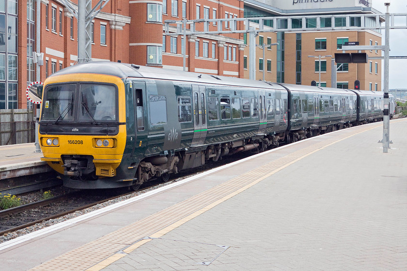 166208, GW unidentified working, Reading station 
 166208 has arrived at Reading's platform two with an unidentified up terminating service. As there is nothing displayed on the LED panel at the front of the train, I suspect that it was an ECS working from the depot. 
 Keywords: 166208 unidentified working Reading station