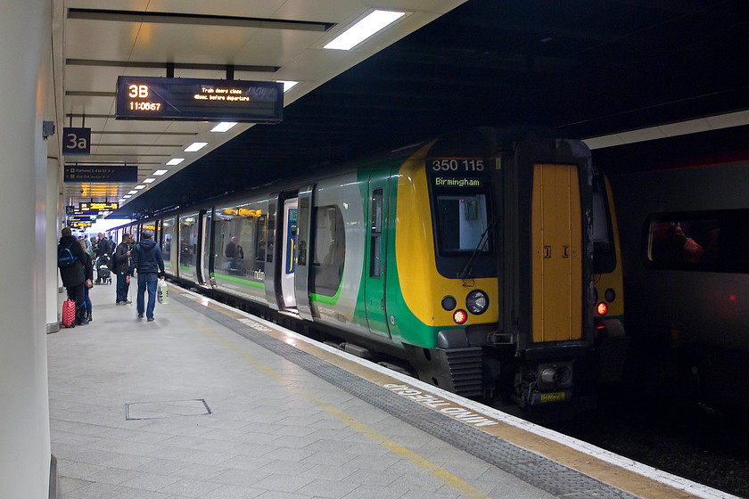 350115 LM 08.49 London Euston-Birmingham New Street (1W05, 5L), Birmingham New Street station 
 Having arrived into the 'new and improved' Birmingham New Street, 350115 stands on platform 3. We had travelled on this, the ex. 08.49 London Euston from Northampton. 
 Keywords: 350115 1W05 Birmingham New Street station