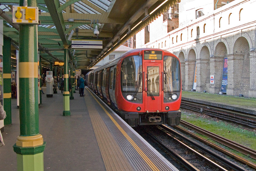 21459, Upminster District Line workingWestminster, South Kensington station 
 A District Line service for Upminster arrives into South Kensington station composed of recently introduced S7 stock set 21459. My wife and I took this train to Westminster for a walk up Whitehall to the Trafalgar Studios. 
 Keywords: 21459 Upminster District Line working South Kensington station