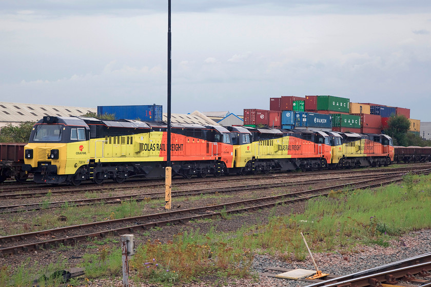 70814, 70811 & 70809, stabled, Eastleigh Yard 
 Colas Rail have a stabling point in Eastleigh Yard. Their livery certainly brightens up a dull late afternoon as the thunder storms head in! Lined up are 70014, 70811 and 70809. 
 Keywords: 70814 70811 70809 stabled Eastleigh Yard