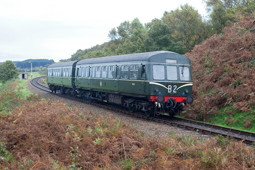 M51192 & M56352, 09.55 Sheringham-Holt, Kelling Bank 
 The first train of the day climbs Kelling Bank just past Weybourne station. The 09.55 Sheringham to Holt service is worked by one of the North Norfolk Railway's resident class 101 DMUs formed of M51192 and M56352. This set is owned by the National Railway Museum and is on long-term loan to the NNR and sees a lot of use. 
 Keywords: M51192 M56352 09.55 Sheringham-Holt Kelling Bank