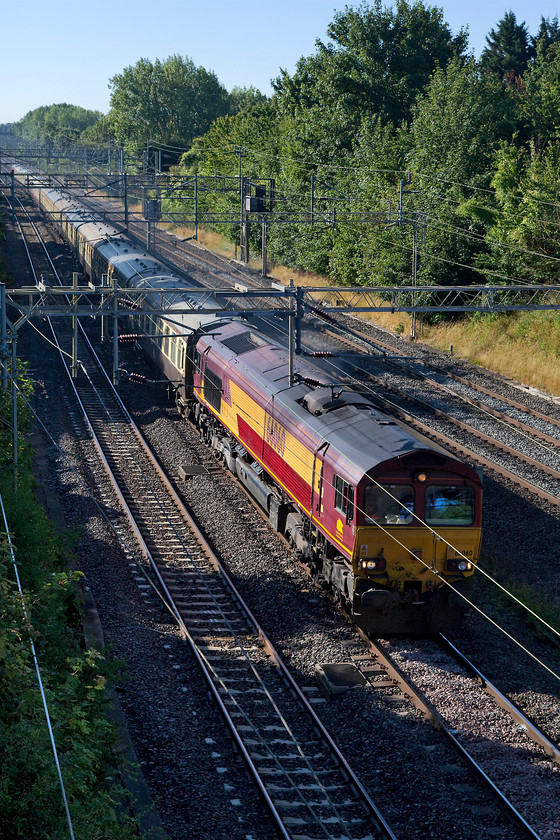 66060, outward leg of The Walsall Concerto, 07.27 London Euston-Birch Coppice Exchange Sidings (1Z33), Victoria Bridge 
 A short time after the Cumbrian Mountain Express passed Victoria Bridge on the down fast, the second railtour of the day passed on the down slow. The Walsall Concerto is seen headed by 66060 and is running from Euston to Birch Coppice Sidings in Birmingham. It then took in a number of other rare pieces of track throughout the West Midlands. 
 Keywords: 66060 The Walsall Concerto 07.27 London Euston-Birch Coppice Exchange Sidings 1Z33 Victoria Bridge