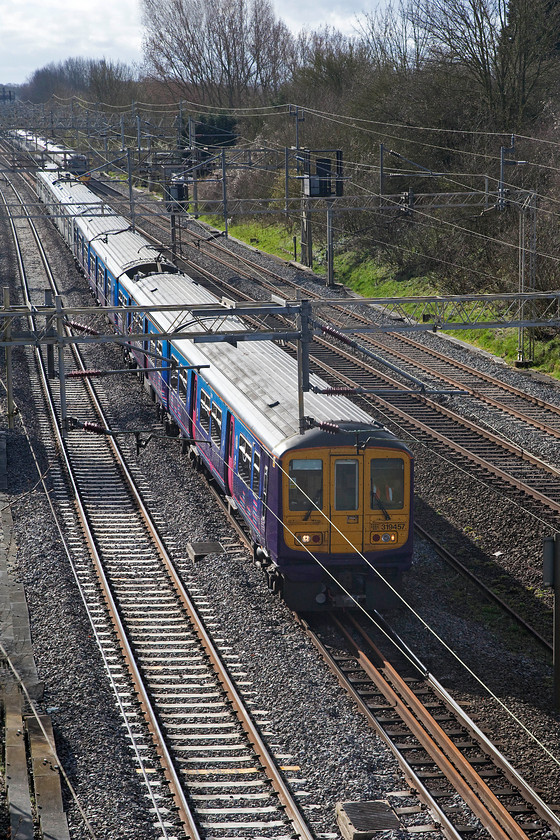 319457 & 319429, LM 09.24 Bletchley CS-Northampton EMUD ECS (5N19), Victoria bridge 
 A regular Saturday morning turn is the 09.24 (or time thereabouts) Bletchley to Northampton Kingsheath depot ECS move. Here, 319457 still in its old First Capital Connect livery leads 319429 past Victoria bridge between Northampton and Milton Keynes. 
 Keywords: 319457 319429 09.24 Bletchley CS-Northampton EMUD ECS 5N19 Victoria bridge