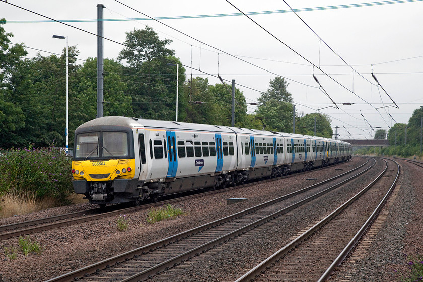 365528 & 365504, GN 09.22 London Kings Cross-Peterbrough (1P46, 3L), St 
 365528 and 365504 leave St. Neots station forming the 09.22 King's Cross to Peterborough. These Networkers have a very uncertain future from next year as new units are due for introduction on this route. 
 Keywords: 365528 365504 1P46 St.Neots station