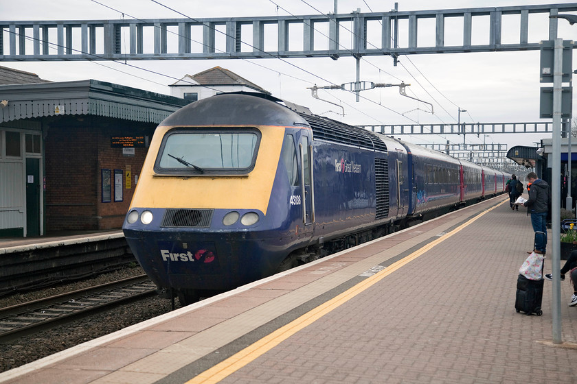 43138, 09.36 London Paddington-Cheltenham (1G21, RT), Didcot Parkway station 
 43138 comes to a halt at Didcot Parkway station leading the 09.36 London Paddington to Cheltenham. My friend Andy and I took this 1G21 working as far as Swindon. 43138 has been a Western Region power car for its entire 39 year life (at the time the picture was taken). This has to be a record of service to be applauded and one that Sir Kenneth Grange can be proud of. 
 Keywords: 43138 1G21 Didcot Parkway station