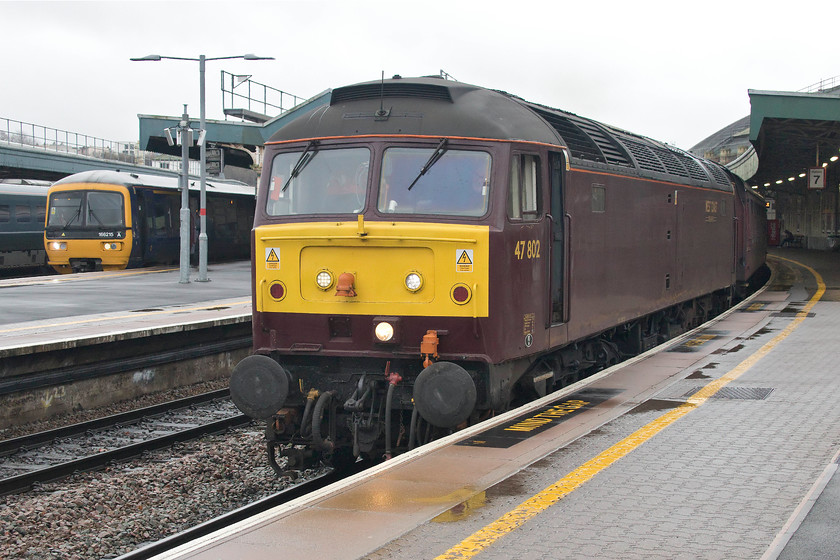 166215, GW 10.45 Newport-Portsmoth Harbour, cancelled from Cardiff Central (1F11, 45L) & 47802, outward leg of The Bath & Cardiff Christmas Markets, 07.14 London Paddington-Cardiff Central (1Z41), Bristol Temple Meads station 
 Two trains stand at Bristol Temple Meads station, both delayed by the same cause. A train had failed somewhere west of Filton Abbey Wood (according to the repeated announcements over the station tannoys), I suspect that it could have been in the vicinity of the Severn Tunnel. All trains to and from South Wales were either heavily delayed or actually cancelled. In the case of 166215, it started from Newport instead of Cardiff as the 10.45 1F11 to Portsmouth Harbour, arriving forty-five minutes late. 47802 is waiting to take the heavily delayed Bathe and Cardiff Christmas markets charter on to the Welsh capital having arrived in from Bath and Paddington earlier with 60163 "'Tornado' now attached to the rear. This excursion eventually arrived at Cardiff to deposit its despondent passengers some two hours later than planned. 
 Keywords: 166215, GW 10.45 Newport-Portsmouth Harbour, cancelled from Cardiff Central (1F11, 45L) & 47802, outward leg of The Bath & Cardiff Christmas Markets, 07.14 London Paddington-Cardiff Central (1Z41), Bristol Temple Meads station