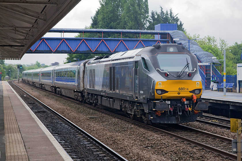 68014, CH 07.05 Kidderminster-London Marylebone (1H22, 2L), Princes Risborough station 
 68014 powers the rear of the 07.05 Kidderminster to London Marylebone through Princes Risborough station. These 100mph 3 300Hp class 68s are not really stretched on these workings, the noise from them is more of a single-tone drone with little variation in their pitch. If I'm honest, these modern engines sound a bit boring when compared to older technology such as a class 50 or a 55! 
 Keywords: 68014 1H22 Princes Risborough station