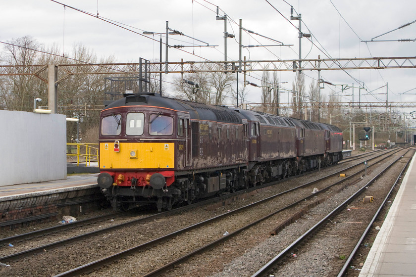 33029, 57001, 47746 & 57313, 10.32 Southall WCR-Carnforth Steamtown (0M43), Northampton station 
 The 0M43 light engines move passes northwards through Northampton station. It is good to see some vintage motive power on the mainline, even though it is in WCR's dreadful drab livery that hardly stands out on a dull February day. The 10.32 Southall WCR to Carnforth Steamtown is formed by 33029, 57001, 47746 and, leading up at the front, 57513. 
 Keywords: 33029,57001 47746 57313 10.32 Southall WCR-Carnforth Steamtown 0M43 Northampton station