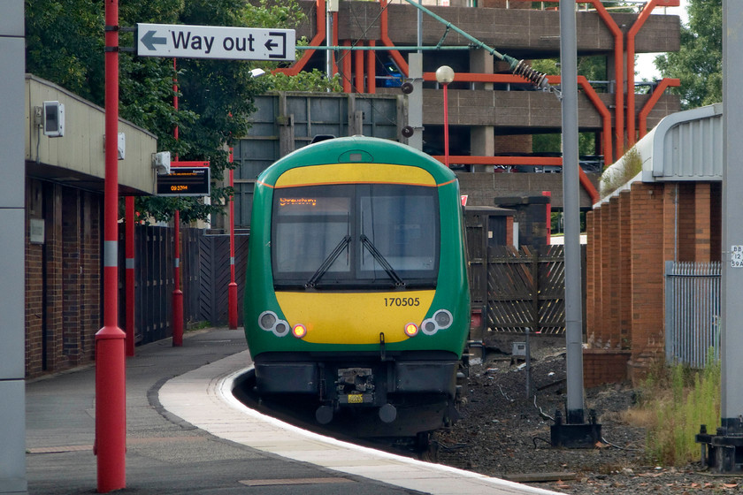 170505, LM stabled, Wolverhampton station 
 170505 is seen stabled at Wolverhampton station in the north-facing bay platform. Close examination reveals the dot matrix display suggesting that the unit will work a local to Shrewsbury. 
 Keywords: 170505 stabled Wolverhampton station London Midland Turbostar