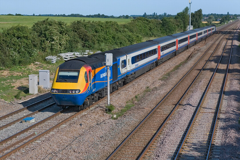 43082, EM 07.18 Derby-London St. Pancras (1C17), Lower Farm Road, Bromham TL028518 
 Whilst I would have cursed the introduction of the HSTs on the MML back in the 1980s they are now embedded in its operations north of St. Pancras as far as Sheffield, Leeds and York. They are now very much in their final years of operation with the forthcoming electrification now underway so I always try and capture one in operation when I can. 43082 'The Railway Children' leads the 1C17 07.18 derby to St. Pancras service past Bromham. 
 Keywords: 43082 07.18 Derby-London St. Pancras 1C17 Lower Farm Road Bromham TL028518 EMT East Midlands Trains HST The Railway Children