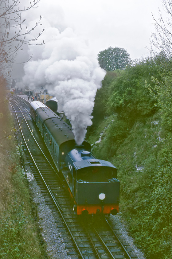 196, 11.30 New Alresford-Ropley, Sun Lane New Alresford 
 196 'Errol Lonsdale' gets away from New Alresford station running tender first leading the 11.30 to Ropley. Unfortunately, on the day of our visit the weather was very dull and overcast meaning photographs, such as this one, were a little disappointing. 
 Keywords: 196 11.30 New Alresford-Ropley Sun Lane New Alresford Watercress Line Mid-Hants Line Errol Lonsdale