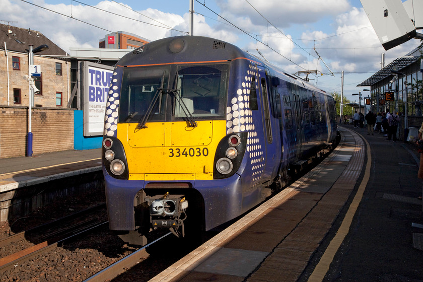 334030, SR 18.11 Springburn-Dalmuir (2F09, 1L), Partick station 
 After collecting our bags from the excellent value left luggage facility at Glasgow's Buchanan bus station Andy and I made our way to Central station via Queen Street Low Level, Partick and Central Low level. Having alighted from 334030, it waits to leave Partick station forming the 18.11 Springburn to Dalmuir. We had travelled the short distance from Queen Street Low Level on this train. 
 Keywords: 334030 2F09 Partick station