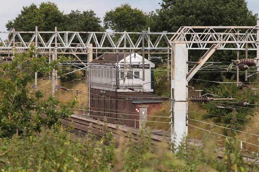 Basford Hall Junction signal box (LNWR, 1897) 
 This is one of a handful of surviving signal boxes still in use on the WCML but their numbers are being reduced constantly and I suspect that this one will be rendered redundant soon. Not a great picture of Basford Hall Junction signal box as this was the closest that I could get to it. It controls the access to the huge Basford Hall Yard complex and was built by the LNWR in 1897. 
 Keywords: Basford Hall Junction signal box