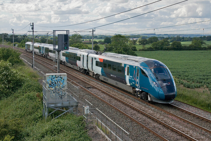 805012, VT, 15.32 Chester-London Euston (1A48, 25L), Milton Crossing 
 My first picture of a Class 805 Evero in service for Avanti is seen passing Multon Crossing just north of Roade cutting. It is working the 1A48 15.32 Chester to Euston service that was, unfortunately badly delayed as it approached London arriving twenty-five minutes adrift. 
 Keywords: 805012 15.32 Chester-London Euston 1A48 Milton Crossing