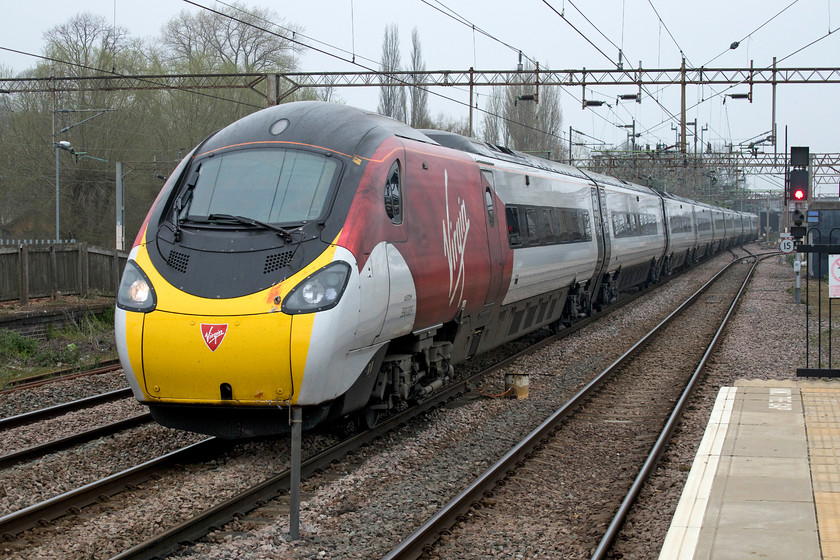 390005, VT 08.05 Manchester Picadilly-London Euston (1A03, 3E), Northampton station 
 390005 'City of Wolverhampton' passes slowly through Northampton's centre road with the 08.05 Manchester Piccadilly to Euston diverted off the Weedon loop. 
 Keywords: 390005 08.05 Manchester Picadilly-London Euston 1A03 Northampton station