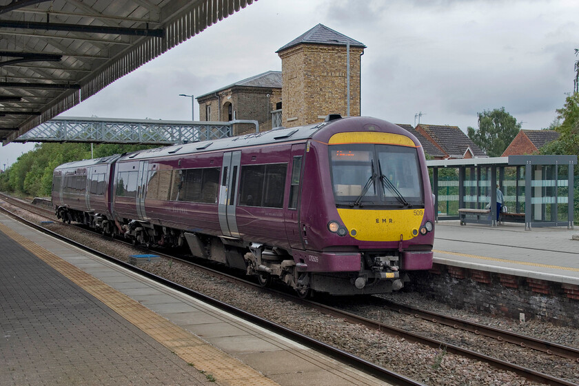 170509, EM 13.21 Peterborough-Lincoln Central (2K16, 1L), Spalding station 
 East Midlands' 170509 pauses at Spalding station working the 13.21 Peterborough to Lincoln service. When I first visited Spalding station back in 1980 I found it to be from a past era and in a very run-down state even discovering a large enamel running in sign laying on and disused trackbed., see... https://www.ontheupfast.com/p/21936chg/29682542804/enamel-spalding-station 
 Keywords: 170509 13.21 Peterborough-Lincoln Central 2K16 Spalding station EMR East Midlands Railway Turbo