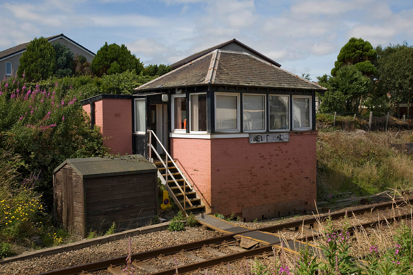 Newtonhill signal box (Caledonian, 1876) 
 Apart from replacement windows the 1876 Caledonian Railway N1+ signal box looks largely unmolested complete with its hipped roof. The signal box used to sit at the northern end of the down station platform that closed in 1956. Network Rail has plans to re-signal this section of line to Stonehaven (and eventually beyond) in the next few years so I suspect that the box is living on borrowed time. 
 Keywords: Newtonhill signal box Caledonian Railway