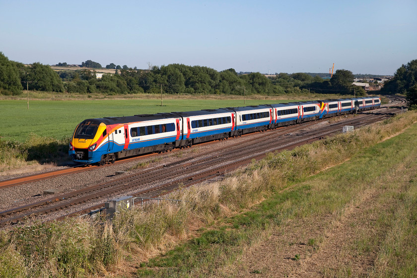 222020 & 222012, EM 17.50 London St. Pancras-Melton Mowbray (1M61, RT), Harrowden Junction 
 A ten-car East Midlands' Meridian takes the slow line over Harrowden Junction working the 17.50 London St. Pancras to Melton Mowbray. This train will soon stop at Kettering and then take the Corby line, over Harringworth Viaduct to Manton Junction and then to Melton Mowbray. These class 222s have been in front-line service for 15 years now and have provided a good service. However, if you have to ride on them every day you may find them tiresomely noisy and notice that they do not ride well on all sections of tracks. 
 Keywords: 222020 222012 1M61 Harrowden Junction