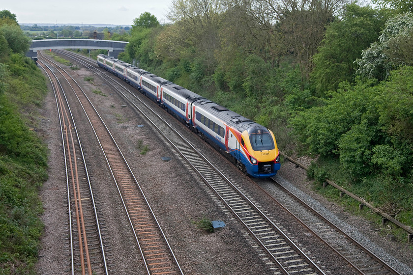 222001, EM 09.58 London St. Pancras-Sheffield (1F21, 2E), Highfield Bridge, Oakley 
 222001 'The Entrepreneur Express' passes Oakley in Bedfordshire forming the 09.58 St. Pancras to Sheffield. The picture is taken from the lofty heights of Highfield Bridge in the village. Whilst the bridge offers great views of the line, it is a little exposed and this spring day was not a warm one and I was a little underdressed and was pleased to move to the next spot! 
 Keywords: 222001 1F21 Highfield Bridge, Oakley