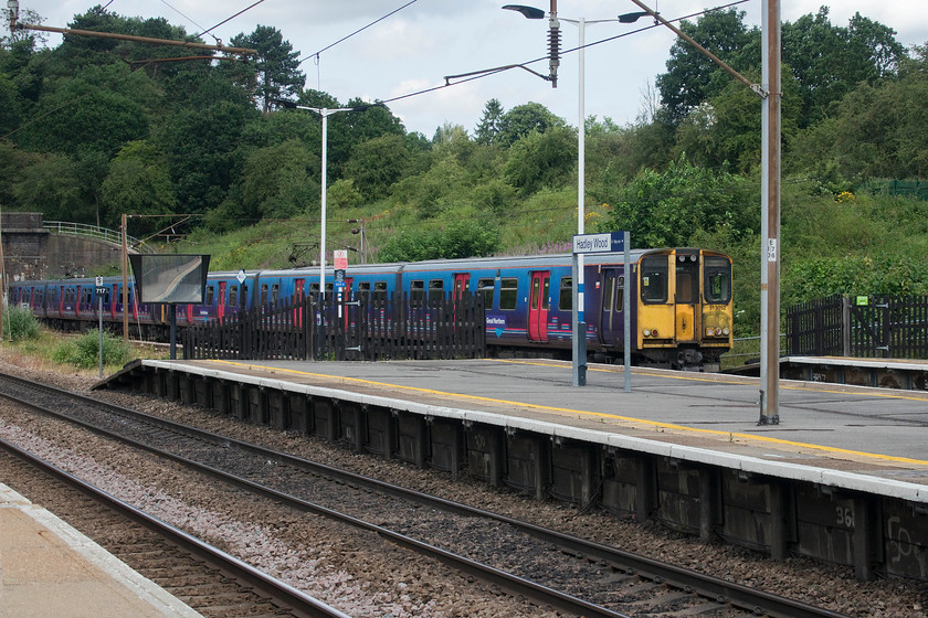 313052, GN 13.39 Welwyn Garden City-Moorgate (2K82, RT), Hadley Wood station 
 The withdrawal of the veteran class 313s commenced in April 2019 as the class 717s entered service. There are still a number in operation but withdrawals are taking place on a weekly basis with them being dispatched pretty much immediately for scrapping. At the time of writing, exactly half of Great Northern's fleet had been withdrawn. In its twilight weeks of operation, 313052 enters Hadley Wood with the 13.39 Welwyn Garden City to Moorgate service. 
 Keywords: 313052 13.39 Welwyn Garden City-Moorgate 2K82 Hadley Wood station