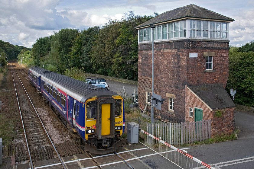 156496, NT 07.08 Glasgow Central-Newcastle (1E95), Prudhoe station 
 156496 arrives at Prudhoe station passing the impressive forty-five lever frame NER 1872 signal box. It is working the 07.08 Glasgow Central to Newcastle service, a joint operation between ScotRail and Northern. The train will have taken the Glasgow and South Western Railway route from Glasgow via Kilmarnock and Dumfries to Carlisle and thence along the Tyne Valley route to here on the western outskirts of its destination. Just behind the trees in the background to the right of this photograph is the River Tyne. 
 Keywords: 156496 07.08 Glasgow Central-Newcastle 1E95 Prudhoe station ScotRail Northern