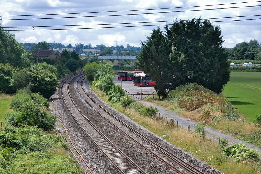 Thingley Junction looking west 
 The scene looking west from the overbridge near to Thingley Junction will soon be totally changed with the installation of the electrification equipment. The lines in view were closed at the time the picture was taken for some months due to extensive works in Box tunnel some three miles away to lower the track in preparation for the wiring. 
 Keywords: Thingley Junction looking west Bath Cippenham