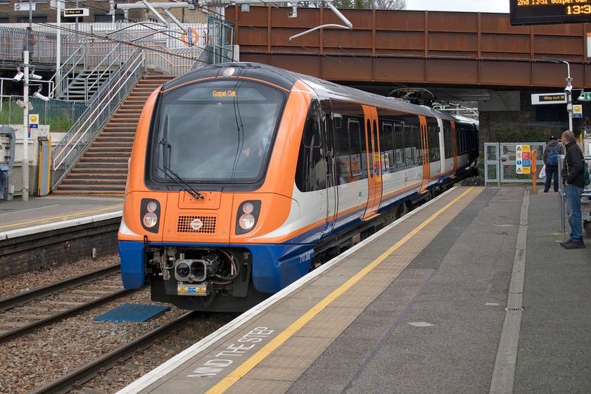 710268, LO 13.22 South Tottenham-Gospel Oak (2J40, 1L), Upper Holloway station 
 Originating from South Tottenham due to closure of the line beyond caused by a freight train derailment in January, the 13.22 to Gospel Oak arrives at Upper Holloway station. Mike, Andy and I travelled on 710268 the short distance to Gospel Oak giving me my first opportunity to sample one of these new Bombardier transportation constructed units introduced, after the customary delay, last year. They seemed functional, bright and airy complete with excellent display screens. One strange observation was that they had a small cluster of usb sockets somewhat randomly and inconveniently located on the bulkhead of the carriage ends. 
 Keywords: 710268 13.22 South Tottenham-Gospel Oak 2J40 Upper Holloway station London Overground