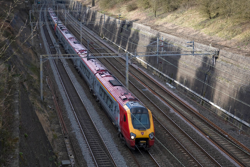 Class 221s, VT 14.35 Chester-London Euston (1A43), Roade cutting 
 Just a few minutes after the previous photograph was taken, another pair of Voyagers head south through Roade cutting. The ten-car train is working the 14.35 Chester to Euston 1A35 service. 
 Keywords: Class 221 14.35 Chester-London Euston 1A43 Roade cutting Voyager Virgin West Coast