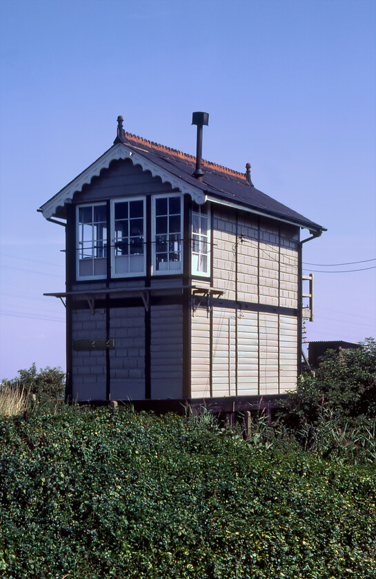 Black Bank signal box (GE, 1883) 
 A second view of Black Bank signal box located between Ely and March. The Great Eastern box, dating from 1883, was closed by BR in 1988 and was then bought by a local resident who removed the top, removed it and set it down in his garden a short distance away. This information was gleaned from the Cambridgeshire Community Archive Network. 
 Keywords: Black Bank signal box GE Great Eastern