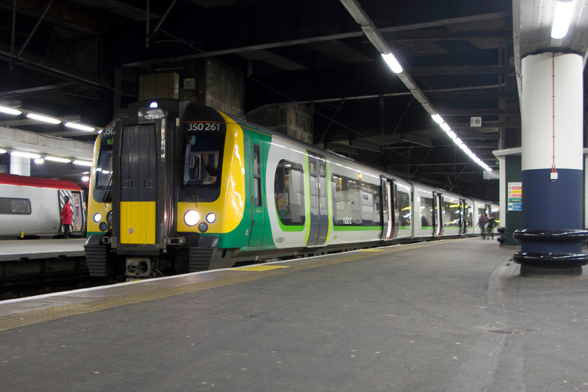 350261, LM 20.46 London Euston-Crewe (1Y85), London Euston station 
 Our train home from London waits at Euston. With my wife on-board, I have gone to the front of the train and set my mini-tripod up on the platform. 350261 will take us back to Northampton as the 1Y85 20.46 to Crewe. 
 Keywords: 350261 20.46 London Euston-Crewe 1Y85 London Euston station