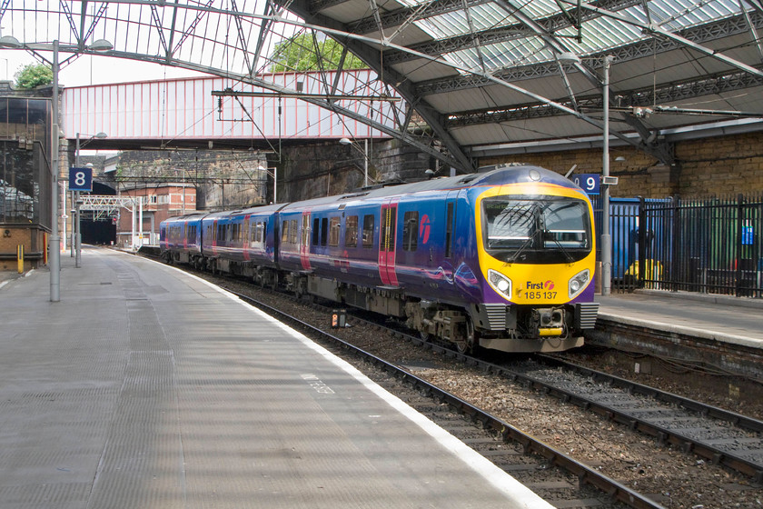 185137, TP 13.10 Newcastle-Liverpool Lime Street (1F69), Liverpool Lime Street station 
 185137 slows as it enters platform nine of Liverpool LIme Street station with the 13.10 from Newcastle. These class 185s are competent units that are reliable and comfortable to ride in. However, they have been plagued by high running costs with various strategies tried in an attempt to reduce their fuel consumption including enhanced driver training and monitoring of their use of the power controller! 
 Keywords: 185137 13.10 Newcastle-Liverpool Lime Street 1F69 Liverpool Lime Street station Trans Pennine Express TPE