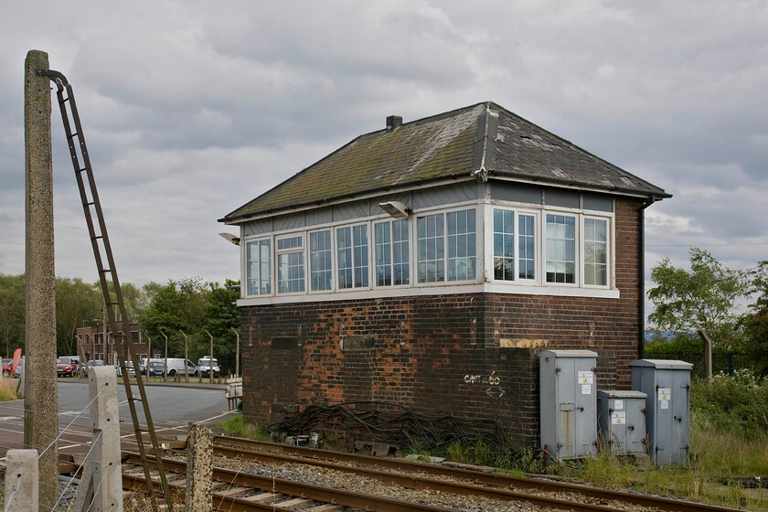 Urlay Nook signal box (NE, 1896 E) 
 According to the SRS the curiously named Urlay Nook signal box dates from possibly 1896 and this would fit as it is an example of North Easterns Type C2a structure with its hip roof. The box was supposed to have been closed last year (2013) but due to issues with the replacement automatic barriers and sighting problems, it has been awarded a stay of execution. 
 Keywords: Urlay Nook signal box North Eastern Railway