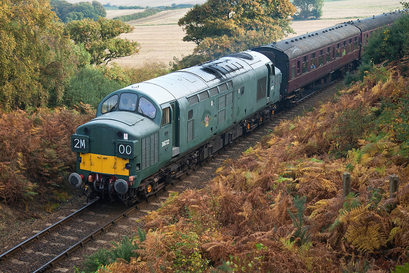 D6732, 09.45 Sheringham-Holt, Kelling bank 
 D6732 storms up Kelling Bank with the first train of the day, the 09.45 Sheringham to Holt. This is my favourite spot on the length of the North Norfolk Railway. It affords superb views out over the North Sea and is a lovely quiet spot to watch the trains pass. The added bonus is that train going in the direction of the class 37 are working hard up the bank. 
 Keywords: D6732 09.45 Sheringham-Holt Kelling bank