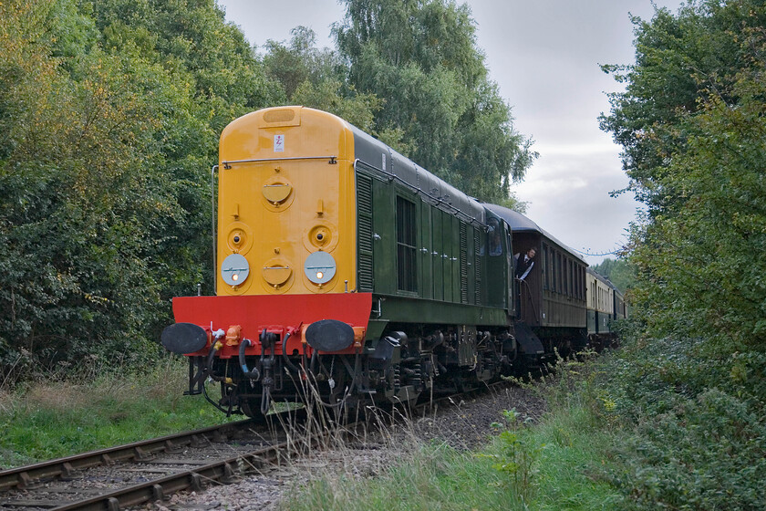 20001, 09.30 Peterborough Nene Valley-Wansford (2M43), Ferry Meadows TL153970 
 D8001 approaches Ferry Meadows leading the 09.30 Peterborough Nene Valley to Wansford. The train crew are struggling for sighting as they approach the station with the Class 20 working nose first despite the narrow body of the locomotive that contrasts with the continental stock with a very different loading gauge. 
 Keywords: 20001, 09.30 Peterborough Nene Valley-Wansford (2M43), Ferry Meadows TL153970