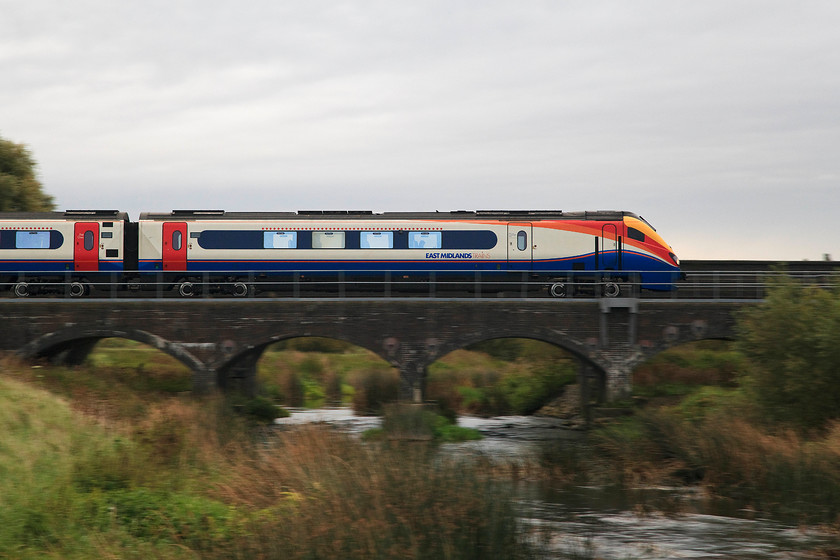 222003, EM 06.29 Sheffield-London St. Pancras (1C15, 3L), Radwell Viaduct TL008569 
 A pan shot as 222003 'Tornado' crosses the River Great Ouse near Radwell in Bedfordshire. I like pan shots as they really focus the eye on some aspect of the subject that is not normally so obvious. For example, I think that the wheel sets of the class 222 look very small and out of proportion to the size of the train. 
 Keywords: 222003 06.29 Sheffield-London St. Pancras 1C15 Radwell Viaduct TL008569