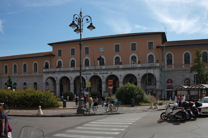 Frontage, Pisa Central station 
 The frontage of Pisa Central station. It is a busy station with 16 platforms that handles fifteen million passengers per year, the majority being tourists. 
 Keywords: Pisa Central station