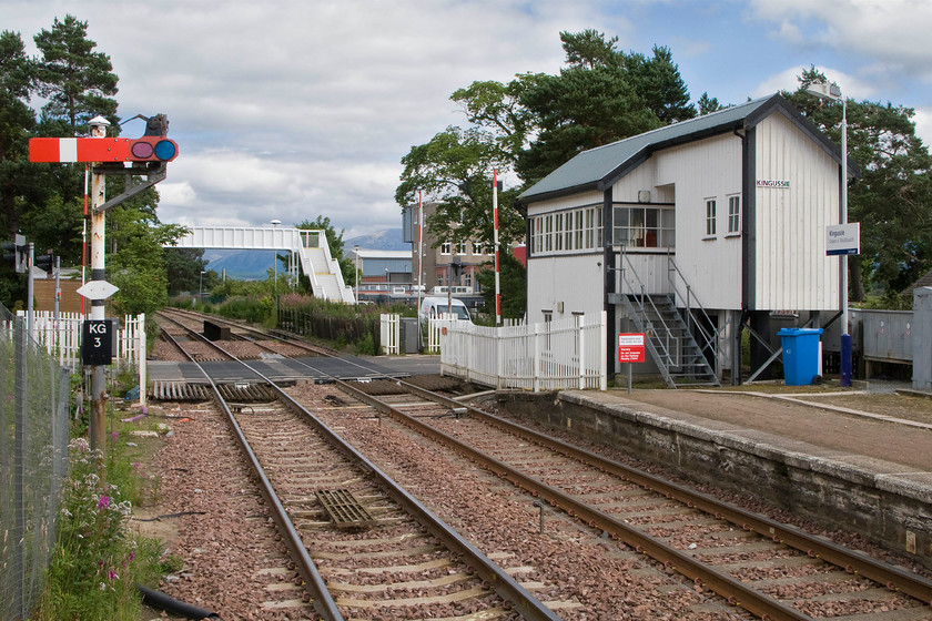 Kingussie signal box & down starter (HR, c.1894) 
 Kingussie signal box sits at the northern end of the station adjacent to the up line next to the level crossing. It controls and an array of signals including the oddly positioned down starter. There is some debate and a degree of uncertainty about the date that the box was constructed ranging from 1894 to 1922. Either way it is a Mackenzie and Holland Type 3 box that has had a dreadful ugly extension and galvanised steps added in recent years. This has been done despite that it is listed on the Scottish Highland Historic Environment Record. 
 Keywords: Kingussie signal box down starter Highland Railway