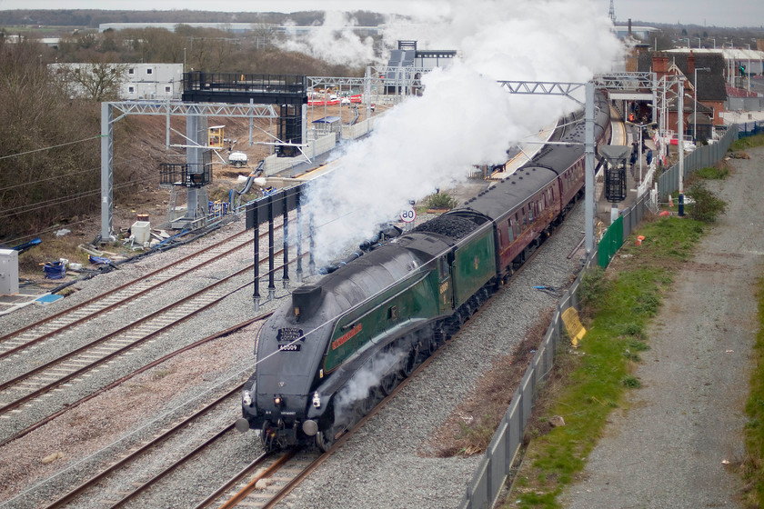 60009, outward leg of The Yorkshireman, 06.36 Ealing Broadway-York (1Z35, 7E), Wellingborough Driver Way bridge 
 Leaving quite a trail of exhaust behind it, 60009 'Union of South Africa' takes 'The Yorkshireman' charter through Wellingborough station. The A4 had brought the train from Ealing Broadway and was heading for York arriving a little ahead of schedule with no repeat of its persistent hot box issue on one of the tender axles that has caused problems in recent months. Apart from one more railtour on 28.03.20 and a possible appearance at the Great Central Railway that will be it for John Cameron's fine locomotive with permanent retirement taking place from 22.04.20. 
 Keywords: 60009 The Yorkshireman 06.36 Ealing Broadway-York 1Z35 Driver Way bridge Wellingborough Union of South Africa The Railway Touring Company