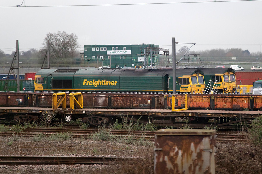 66538 & 66506, stabled, Crewe Basford Hall 
 With the large Freightliner Basford Hall 'portakabin' in the background, 66538 and 66506 are seen stabled in the huge yard at Crewe. 
 Keywords: 66538 & 66506, stabled, Crewe Basford Hall