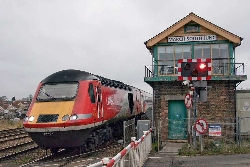 43313, GR 10.00 Newcastle-London King`s Cross (1Y24, 4E), March South Junction 
 43313 leaves March past the South Junction signal box and level crossing leading the 1Y42 10.00 Newcastle to London King's Cross. There was a lot of activity in and around March with all the diverts as well as Sunday freight and normal workings. A Network Rail response team were out and about visiting all the boxes to ensure that everything was in order with the signalmen being kept busy. 
 Keywords: 43313 10.00 Newcastle-London King's Cross 1Y24 March South Junction