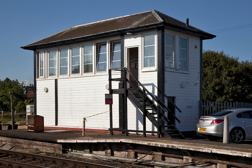 Girvan signal box (GSW, c.1893) 
 Girvan signal box sits proudly on the station end at the station of the same name. It's a classic GSW structure that is in good condition and was opened about 1893. The track layout at Girvan is quite complicated as it is passing point and there is also a pair of rail connected sidings just like the old days! 
 Keywords: Girvan signal box