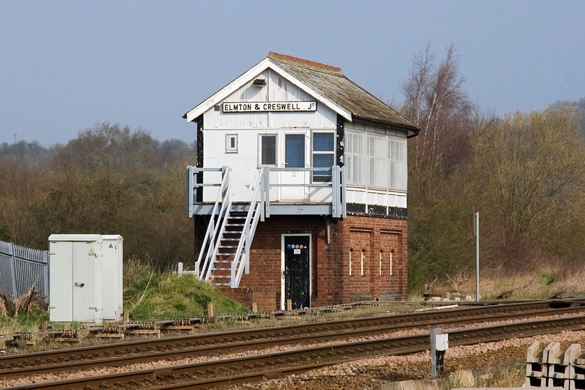 Elmton & Creswell Junction signal box (LMS, 1946) 
 The lovely LMS signal box at Elmton and Creswell. This box opened in 1946 replacing two other Midland boxes. In recent years the box has undergone some renovation but it is no longer in regular use. It is switched out but can operate when circumstances so demand. A station has also opened here to serve the people of the immediate area. I am standing on the platform end to take this photograph. 
 Keywords: Elmton Creswell Junction signal box