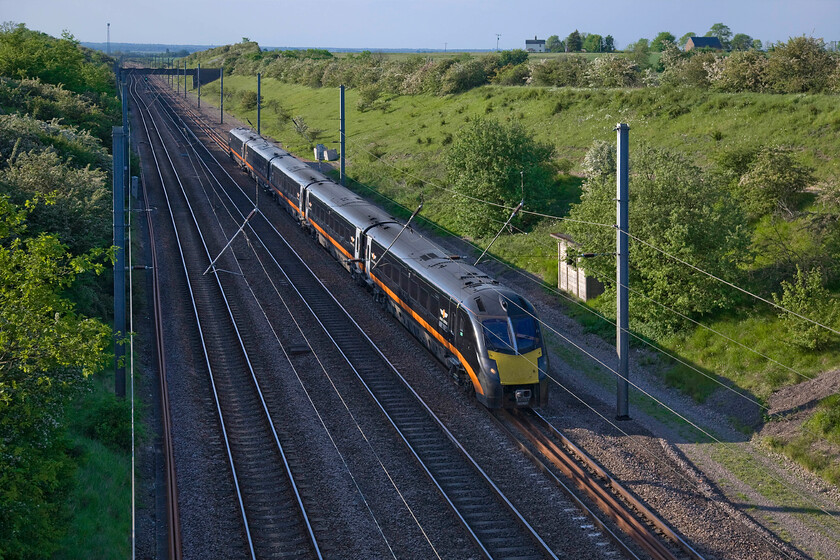 180105, GC 15.29 Sunderland-London King's Cross (1A68), New England bridge TL219796 
 Grand Central's 15.29 Sunderland to King's Cross service is about to pass under New England bridge located between Huntingdon and Peterborough. 180105 has been operated by Grand Central since 2009 after it left the Western Region in 2007 and underwent an overhaul. Notice the lofty position of the appropriately named Hill Farm on the skyline! 
 Keywords: 180105 15.29 Sunderland-London King's Cross 1A68 New England bridge TL219796 Grand Central.jpg